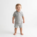 Conjunto polo acanalado de algodón para bebé (polera + short) color gris melange