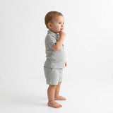 Conjunto polo acanalado de algodón para bebé (polera + short) color gris melange